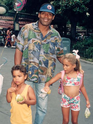 <p>DMI/The LIFE Picture Collection/Shutterstock</p> O. J. Simpson with children Justin and Sydney at Disneyland.