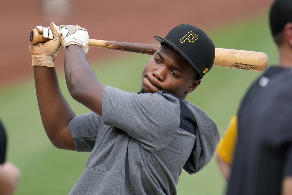 Pittsburgh Pirates first-round draft selection Termarr Johnson waits his turn in the batting cage after signing his contract with the team, before a baseball game between the Pirates and the Philadelphia Phillies in Pittsburgh, Friday, July 29, 2022. (AP Photo/Gene J. Puskar)