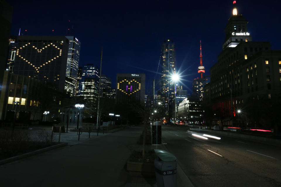 TORONTO, ON- APRIL 15  - The Sheraton and Hilton hotels just off of University Avenue in the downtown are lit with hearts facing Hospital Row as people in Toronto are encouraged to keep physical distancing to slow the spread of COVID-19  in Toronto. April 15, 2020.        (Steve Russell/Toronto Star via Getty Images)