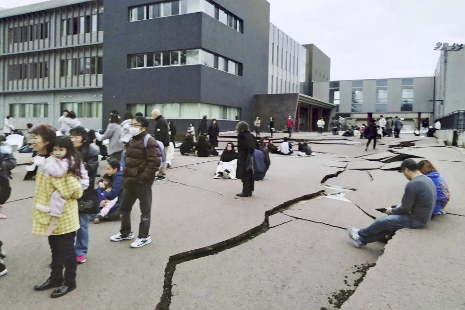 Cracks are seen on the ground in Wajima in Japan's Ishikawa prefecture on Jan. 1, 2024, following an earthquake.  (Kyodo News via AP)