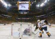 May 29, 2017; Pittsburgh, PA, USA; Nashville Predators goalie Pekka Rinne (35) makes a save against Pittsburgh Penguins right wing Patric Hornqvist (72) in game one of the 2017 Stanley Cup Final at PPG PAINTS Arena. Mandatory Credit: Don Wright-USA TODAY Sports