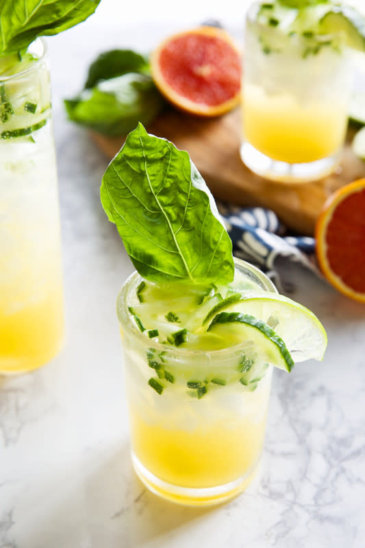 <p>Camille Styles</p><p>Whether you’re kicking alcohol for the month, or just want a new twist for your daily topo chico, this citrus mocktail is equal parts delicious and refreshing. Plus, unlike its boozy cousin, can be enjoyed in copious amounts, at any time of day.</p><p><strong>Get the recipe: <a href="https://camillestyles.com/food/cucumber-basil-citrus-mocktail/" rel="nofollow noopener" target="_blank" data-ylk="slk:Cucumber Basil Citrus Mocktail;elm:context_link;itc:0;sec:content-canvas" class="link rapid-noclick-resp">Cucumber Basil Citrus Mocktail</a></strong></p>