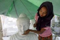 The Wider Image: From statues to toothpaste, the Myanmar village 'blessed' with marble bounty