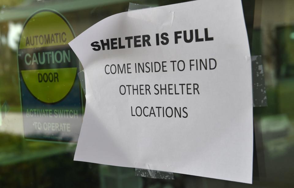 A sign is posted on a door at a hurricane shelter in Naples, Florida.&nbsp;