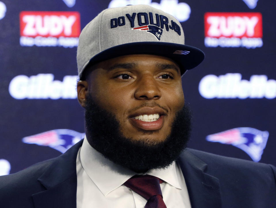 New England Patriots first-round pick Isaiah Wynn tore his Achilles in the team's second preseason game. (AP)