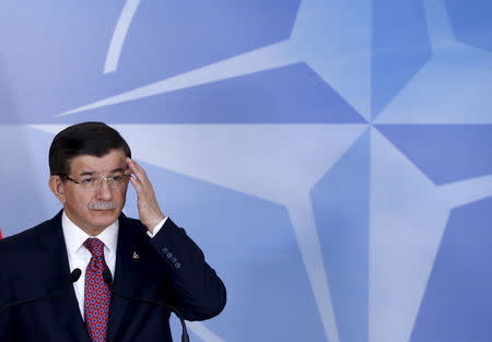 Turkish Prime Minister Ahmet Davutoglu addresses a news conference after meeting NATO Secretary-General Jens Stoltenberg at the Alliance's headquarters in Brussels, Belgium, November 30, 2015. REUTERS/Francois Lenoir -