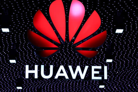 FILE PHOTO: The logo of Huawei is seen at the Mobile World Congress in Barcelona, Spain February 26, 2019. REUTERS/Sergio Perez/File Photo