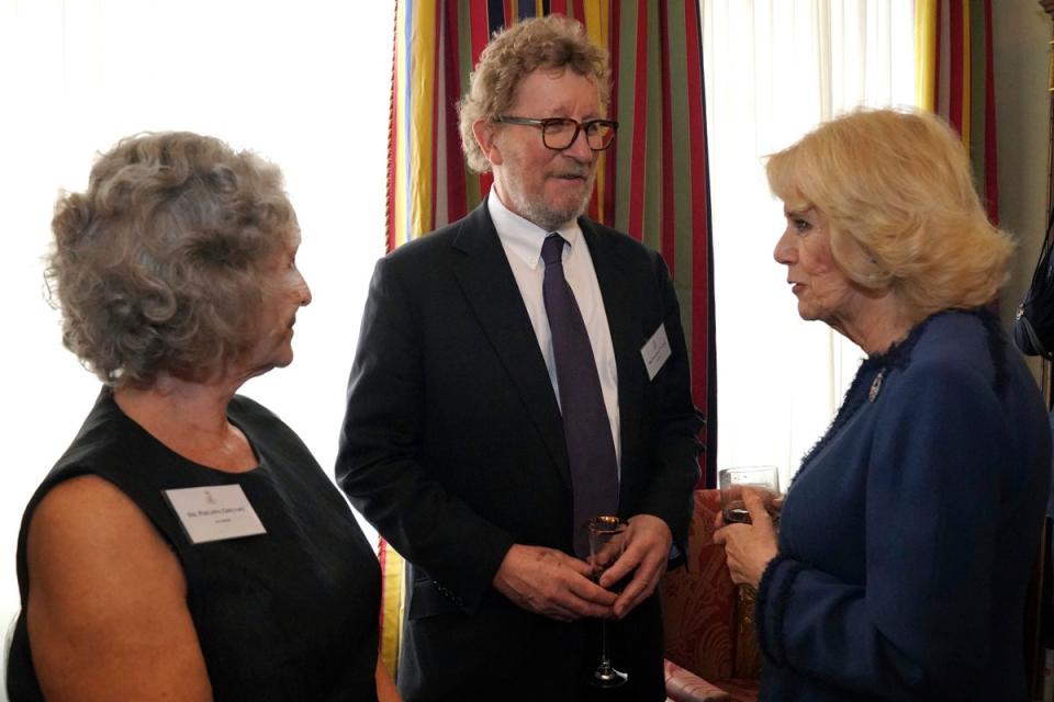 The Queen Consort meets authors Philippa Gregory and Sebastian Faulks (AP)