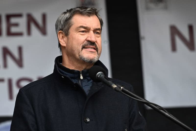 Markus Soeder, Minister President of Bavaria, speaks at the commemoration and demonstration event "365 Days - Munich against Anti-Semitism" to mark the first anniversary of the Hamas' 7th of October attacks on Israel, at the Odeonsplatz. Felix Hörhager/dpa