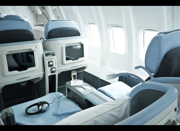 The giant airlines will charge you around $1,200 for a nonstop summer round-trip flight between New York and Paris in a cattle-car economy cabin. But two people paying $1,495 each can move up to an angle-flat business-class seat, with <a href="http://www.smartertravel.com/blogs/today-in-travel/new-airline-sells-business-class-seats-to-europe-for-economy-prices.html?id=19015631" target="_blank">business-class cabin service</a>, on La Compagnie, the niche French airline offering low-cost business-class service from Newark to London/Luton and Paris/DeGaulle. La Compagnie's current fare is almost $1,000 less than the premium economy fares on Open Skies or Air France.      The price gap between regular economy and La Compagnie isn't always this small. But whenever it is, you sure feel better when you arrive in London or Paris after an overnight in business class than in economy. It's worth considering.  <em>Related:</em> <a href="http://www.smartertravel.com/photo-galleries/editorial/secrets-to-booking-the-cheapest-summer-europe-flight-ever.html?id=990" target="_blank">7 Secrets of Ultra-Cheap Europe Flights</a>  <em>(Photo: La Compagnie) </em>