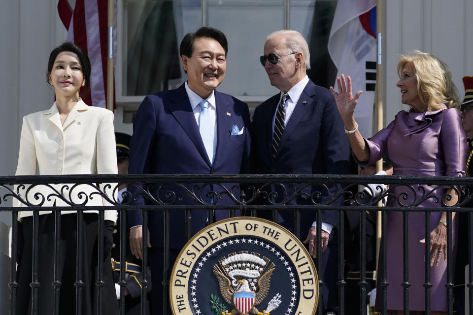 South Korea's first lady Kim Keon Hee, South Korea's President Yoon Suk Yeol, President Joe Biden and first lady Jill Biden stand on the Blue Room Balcony during a State Arrival Ceremony on the South Lawn of the White House Wednesday, April 26, 2023, in Washington. (AP Photo/Evan Vucci)