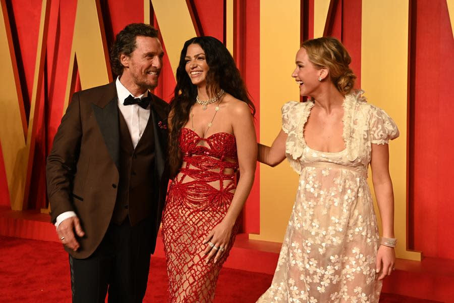 (Left to Right) Matthew McConaughey, Camila Alves and Jennifer Lawrence laugh it up at the 2024 Vanity Fair Oscar Party hosted by Radhika Jones at Wallis Annenberg Center for the Performing Arts in Beverly Hills. (Jon Kopaloff/Getty Images for Vanity Fair)