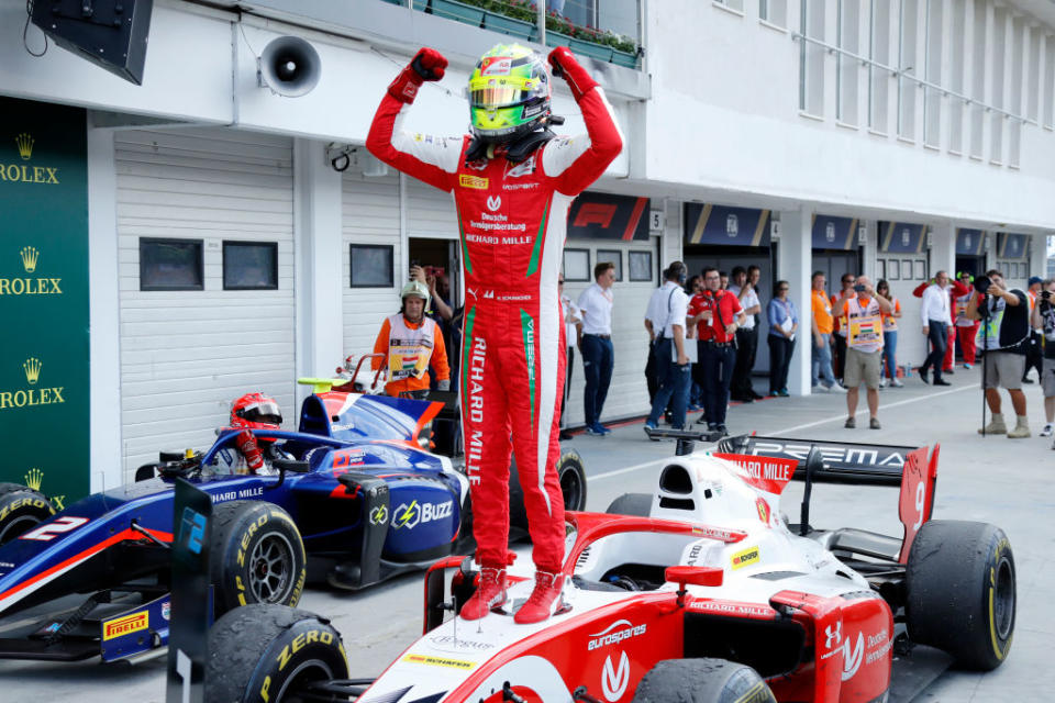 Prema Racing's German driver Mick Schumacher celebrates after winning the Formula Two championship race of the Hungarian Grand Prix. (Photo by Marco Canoniero/LightRocket via Getty Images)