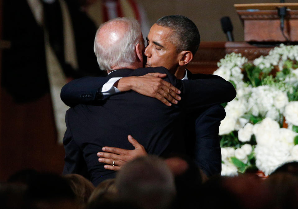 <p>President Barack Obama kisses Vice President Joe Biden on the cheek as he hugs him after delivering the eulogy during the funeral of Biden’s son, former Delaware Attorney General Beau Biden, at St. Anthony of Padua church in Wilimington, Delaware June 6, 2015. (Kevin Lamarque/Reuters) </p>