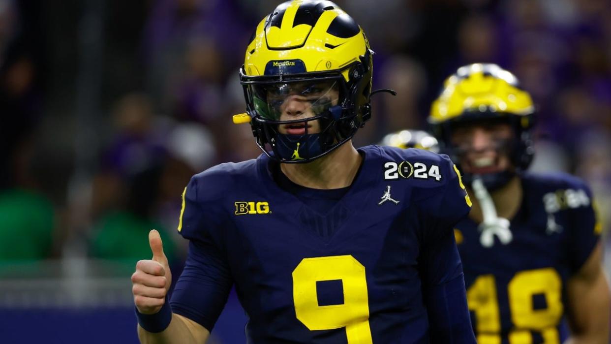 <div>Michigan Wolverines quarterback J.J. McCarthy (9) gives a thumbs up to the sideline during the CFP National Championship game Michigan Wolverines and Washington Huskies on January 8, 2024, at NRG Stadium in Houston, Texas.</div> <strong>((Photo by David Buono/Icon Sportswire via Getty Images))</strong>