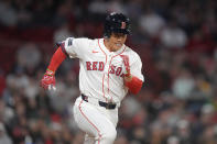 Boston Red Sox's Masataka Yoshida runs toward first as he grounds out in the ninth inning of a baseball game against the Cleveland Guardians, Tuesday, April 16, 2024, in Boston. (AP Photo/Steven Senne)