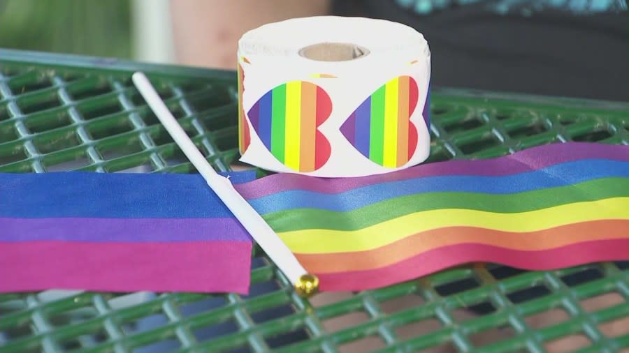 Pride flags being handed out by Moxxie, a 16-year-old high school student in Temecula, to his classmates in protest of the school district’s flag ban policy. (Moxxie)