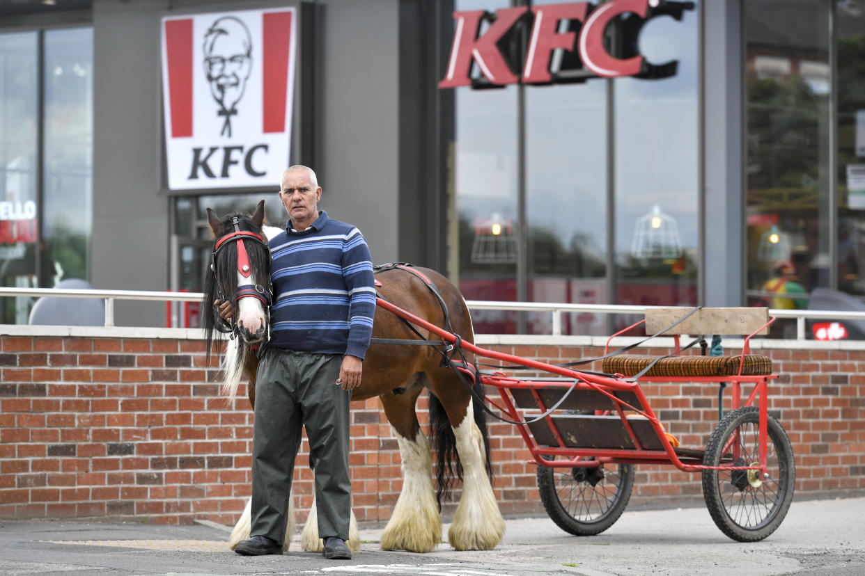 Ian Bell was refused service at a KFC when he tried to go through the drive-thru with his horse and cart. (Picture: SWNS)