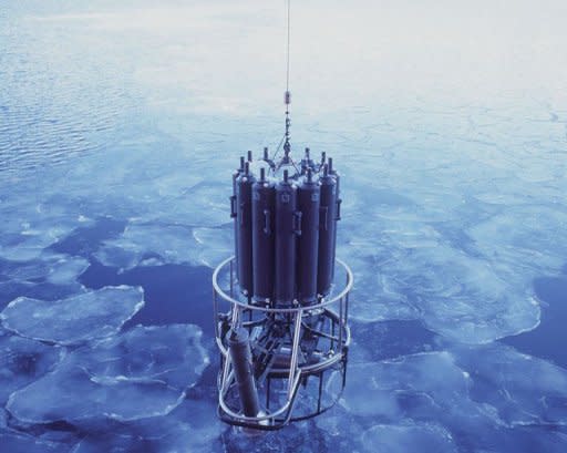 Ocean-measuring instruments are lowered through pancake ice to sample water at various levels from the seafloor to the surface. The densest waters of Antarctica have reduced dramatically over recent decades, in part due to man-made impacts on climate, Australian scientists said on May 4, 2012