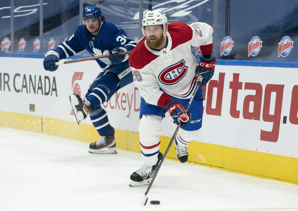 Montreal Canadiens defenceman Jeff Petry (26) skates away from Toronto Maple Leafs center Auston Matthews (34) during the second period of an NHL hockey game in Toronto on Saturday, Feb. 13, 2021. (Frank Gunn/The Canadian Press via AP)