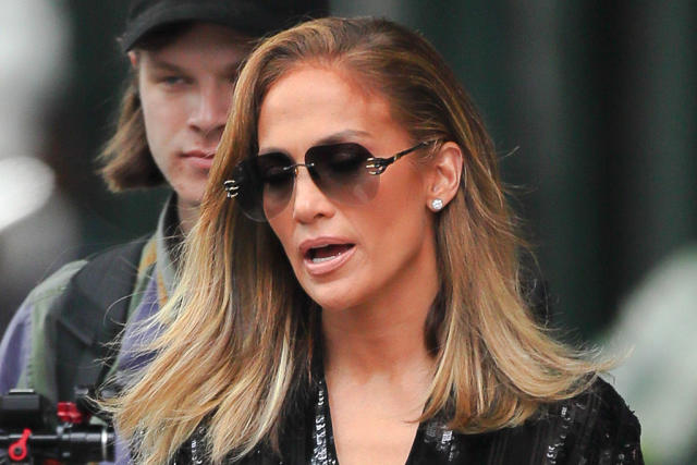 Jennifer Lopez Styles Ripped Jeans With Sweater & Running Sneakers –  Footwear News