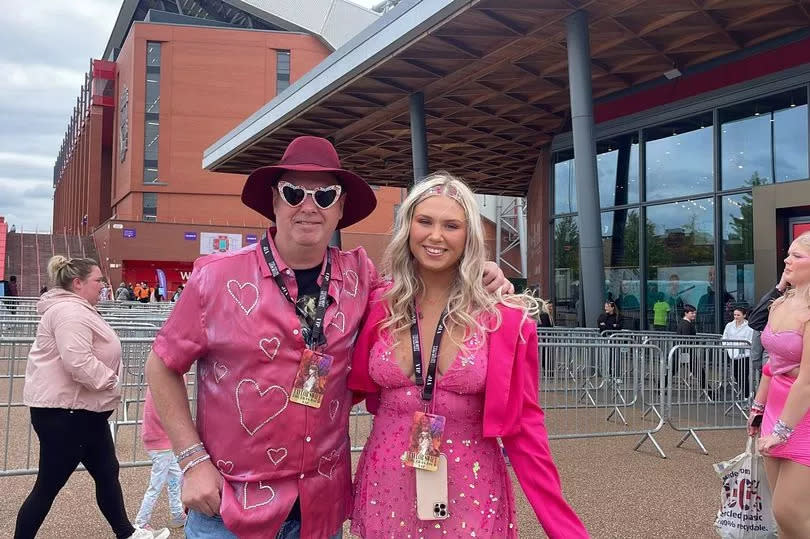 Dad and daughter Pete and Emma, from Leicestershire , among the first to arrive at Anfield for night one of Tayor Swift