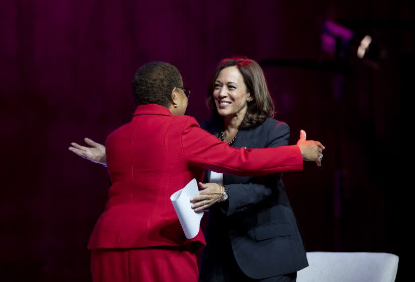 LOS ANGELES, CA - OCTOBER 17, 2022: Vice President Kamala Harris hugs mayoral candidates Karen Bass before a discussion with Bass and Celinda Vazquez, Vice President of Public Affairs for Planned Parenthood of Los Angeles, on protecting reproductive rights at the Nate Holden Performing Arts Center on October 17, 2022 in Los Angeles, California.(Gina Ferazzi / Los Angeles Times)