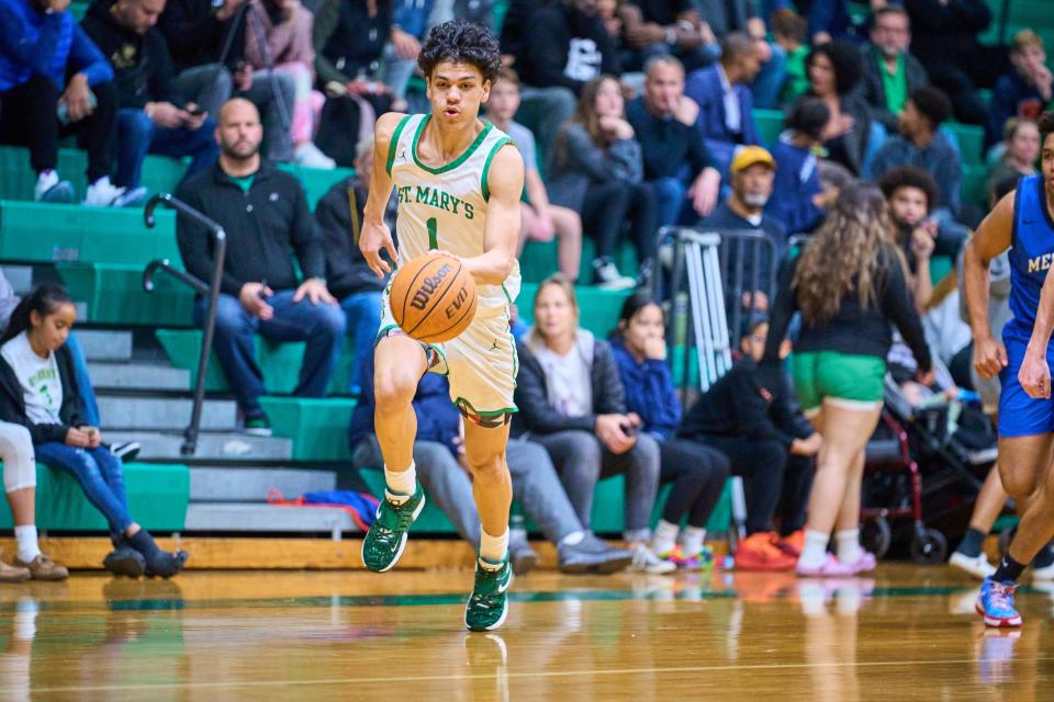 Jan 24, 2023; phoenix, az, usa; St. Mary’s Knights guard Styles Phipps (1) drives the ball against the Mesquite Wildcats at St. Mary's high school gym in Phoenix, on Tuesday, Jan. 24, 2023. Mandatory Credit: Alex Gould/The Republic