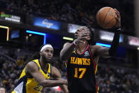 Atlanta Hawks' Onyeka Okongwu (17) shoots against Indiana Pacers' Isaiah Jackson (22) during the first half of an NBA basketball game Friday, Jan. 13, 2023, in Indianapolis. (AP Photo/Darron Cummings)