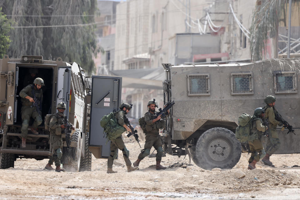 Israeli soldiers operate during a raid on the Nur Shams camp for Palestinian refugees near the town of Tulkarem in the Israeli-occupied West Bank, August 28, 2024. / Credit: JAAFAR ASHTIYEH/AFP/Getty