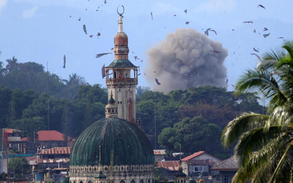 Government troops continue their assault against insurgents from the Maute group - Credit: ROMEO RANOCO/Reuters