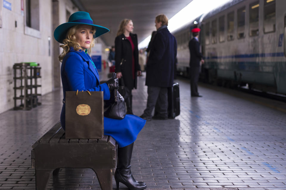 Gillian Anderson as Bedelia waiting for a train