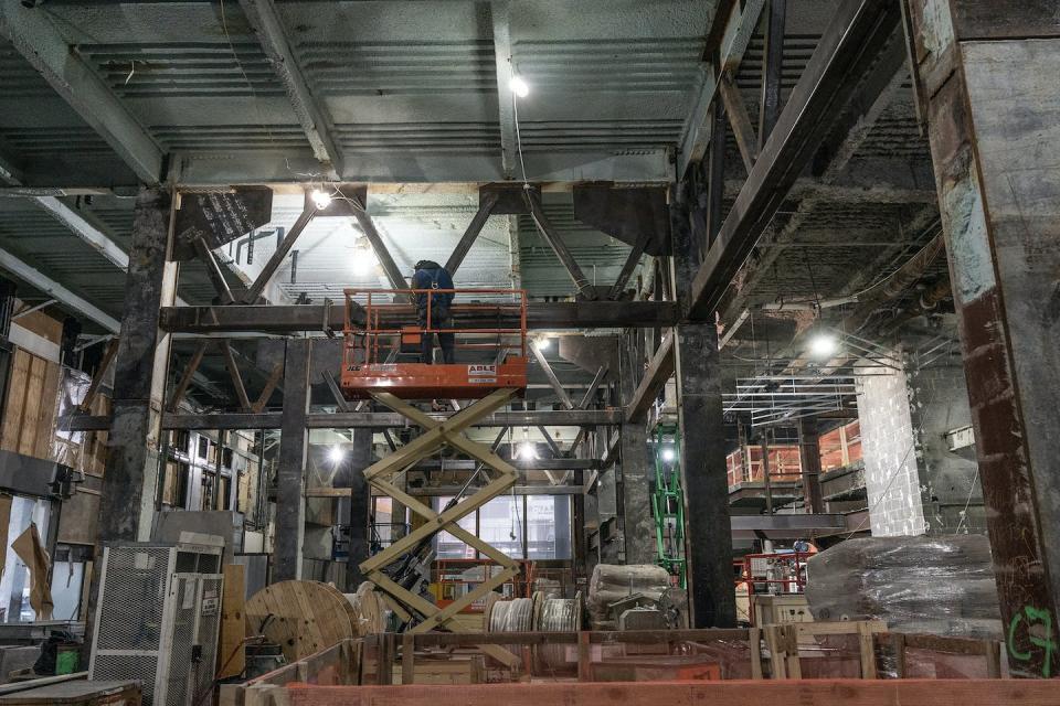 A former office building at 160 Water St. in New York City’s financial district undergoing conversion into 600 apartments in March 2023. <a href="https://www.gettyimages.com/detail/news-photo/view-of-construction-of-the-former-office-building-being-news-photo/1248220271" rel="nofollow noopener" target="_blank" data-ylk="slk:Lev Radin/Pacific Press/LightRocket via Getty Images;elm:context_link;itc:0;sec:content-canvas" class="link ">Lev Radin/Pacific Press/LightRocket via Getty Images</a>