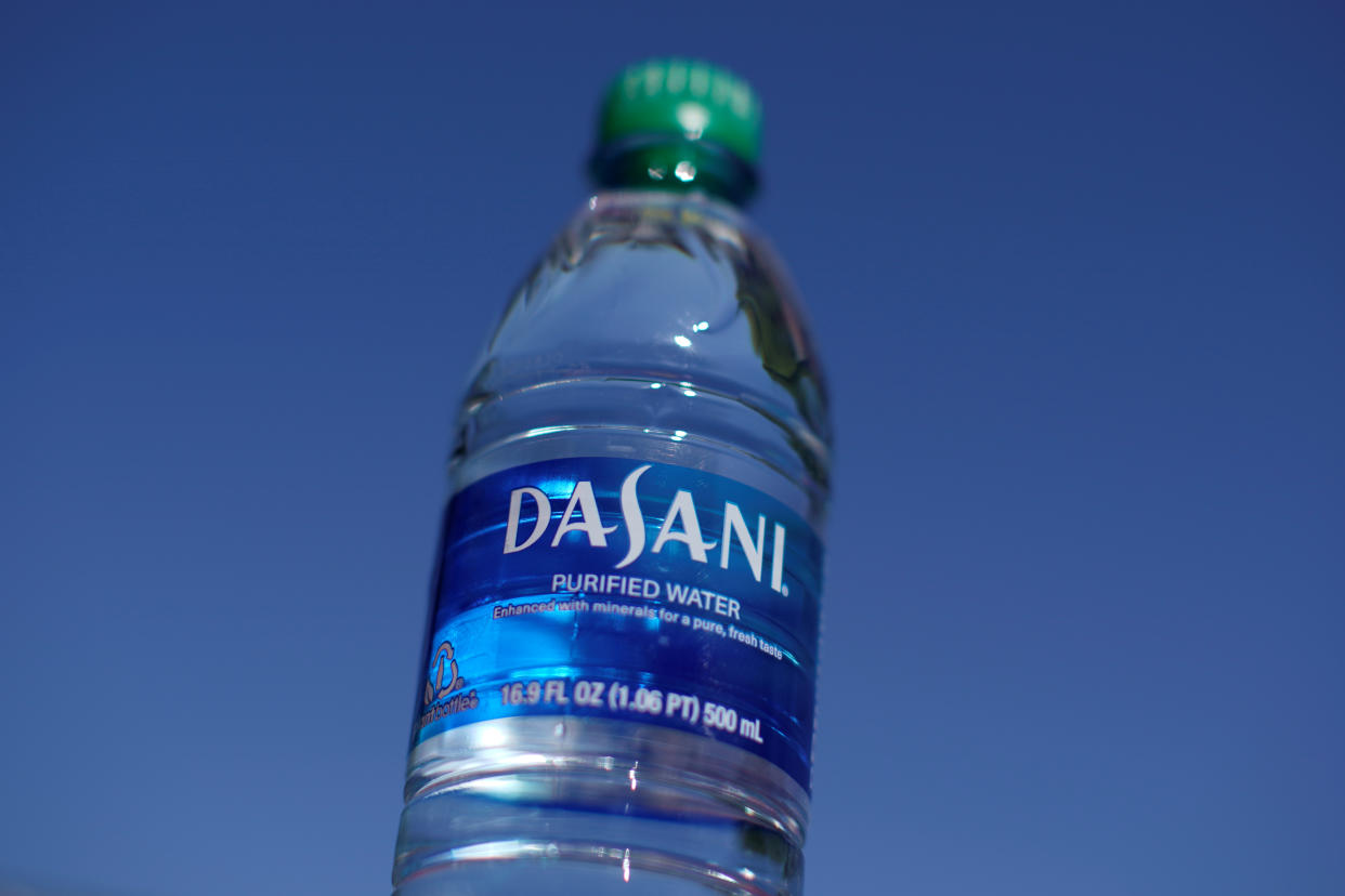 A bottle of Dasani drinking water is shown in this photo illustration.