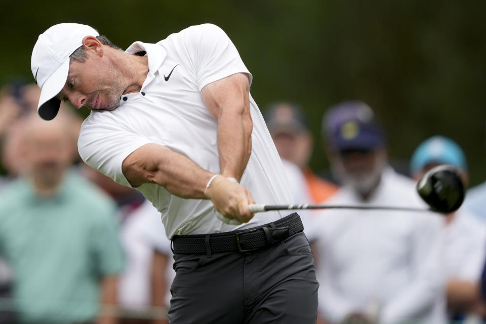 Rory McIlroy, of Northern Ireland, watches his tee shot on the third hole during first round of the Wells Fargo Championship golf tournament at the Quail Hollow Club Thursday, May 9, 2024, in Charlotte, N.C. (AP Photo/Chris Carlson)