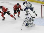 Feb 7, 2019; Chicago, IL, USA; Vancouver Canucks goaltender Jacob Markstrom (25) makes a save against the Chicago Blackhawks during the overtime at United Center. Mandatory Credit: David Banks-USA TODAY Sports