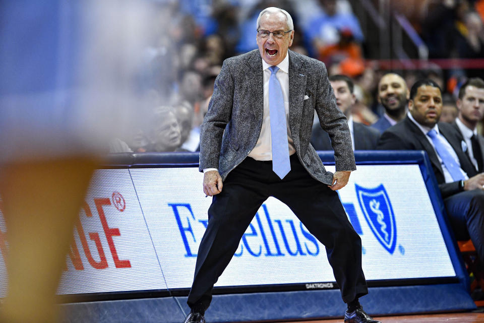 North Carolina head coach Roy Williams shouts to his players during the second half of an NCAA college basketball game against Syracuse in Syracuse, N.Y., Saturday, Feb. 29, 2020. North Carolina defeated Syracuse 92-79. (AP Photo/Adrian Kraus)