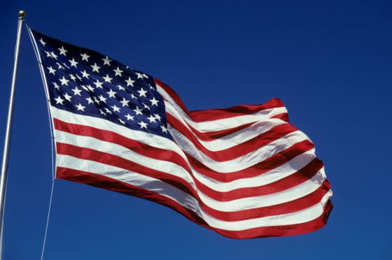 The American Flag waving in the wind.