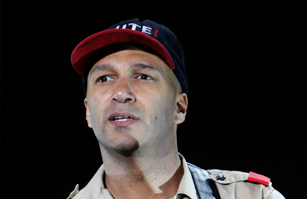 Tom Morello was knocked off stage during a gig in Toronto. credit:Bang Showbiz