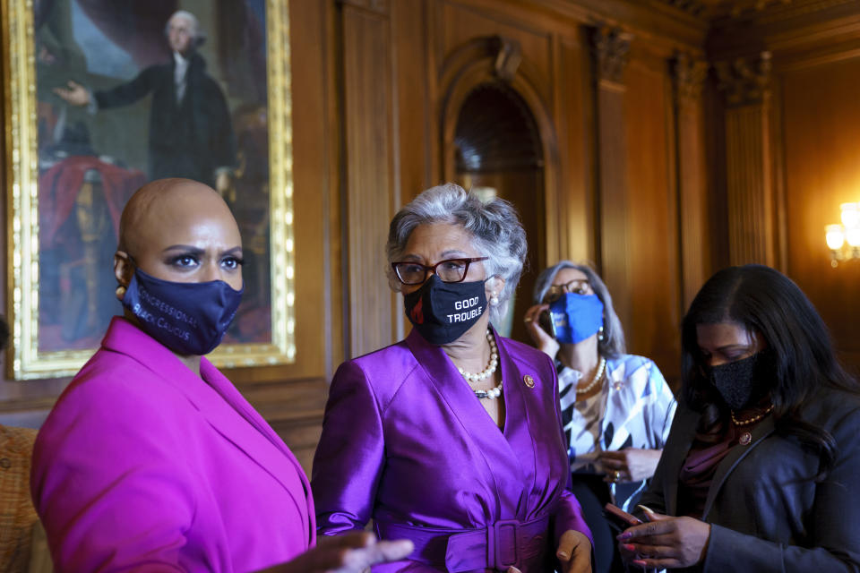 Rep. Ayanna Pressley, D-Mass., left, and Rep. Joyce Beatty, D-Ohio, wait with members of the Congressional Black Caucus for the verdict in the murder trial of former Minneapolis police Officer Derek Chauvin in the death of George Floyd, on Capitol Hill in Washington, Tuesday, April 20, 2021. (AP Photo/J. Scott Applewhite)