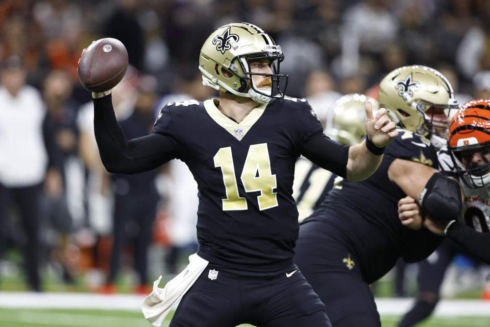 New Orleans Saints quarterback Andy Dalton (14) looks to pass against the Cincinnati Bengals during the second half of an NFL football game in New Orleans, Sunday, Oct. 16, 2022. (AP Photo/Butch Dill)