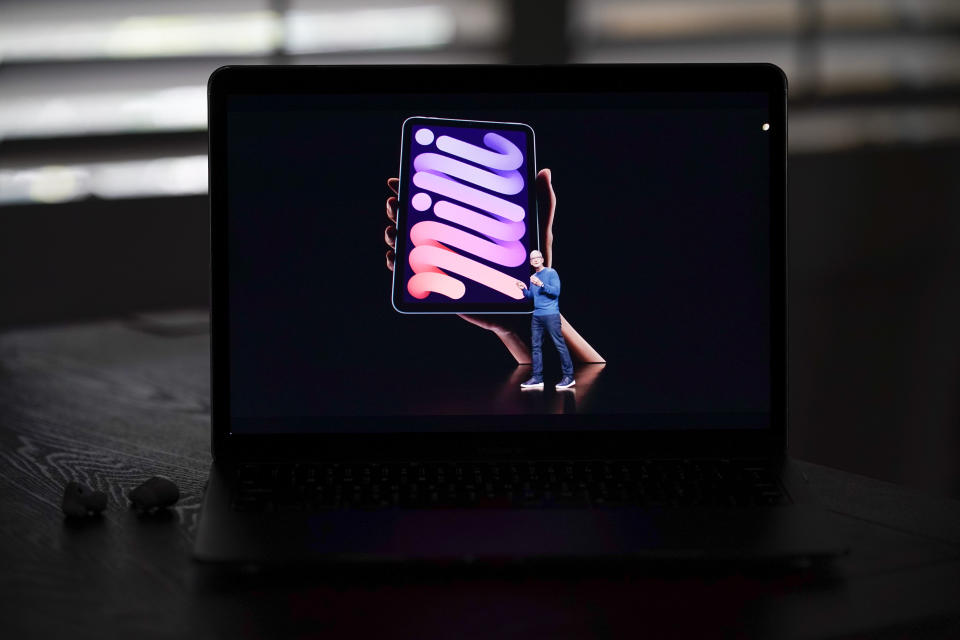 Seen on the screen of a device in La Habra, Calif., Apple CEO Tim Cook introduces the new iPad mini during a virtual event held to announce new Apple products Tuesday, Sept. 14, 2021. (AP Photo/Jae C. Hong)