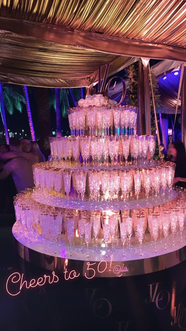 J Lo S 10 Tier Birthday Cake Was Covered In Edible 24 Karat Cold And Swarovski Crystals