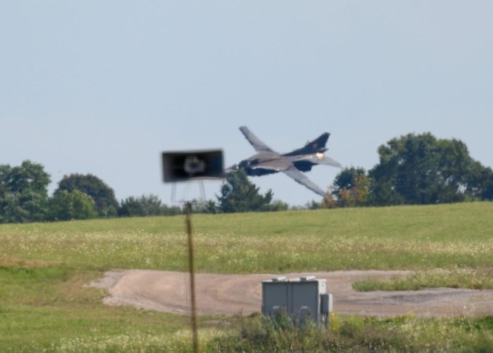 This image shows a MiG-23 aircraft seconds before crashing into the ground at the Thunder over Michigan air show at the Willow Run Airport in Ypsilanti on Sunday, Aug. 13, 2023. Two people ejected from the aircraft prior to the crash.