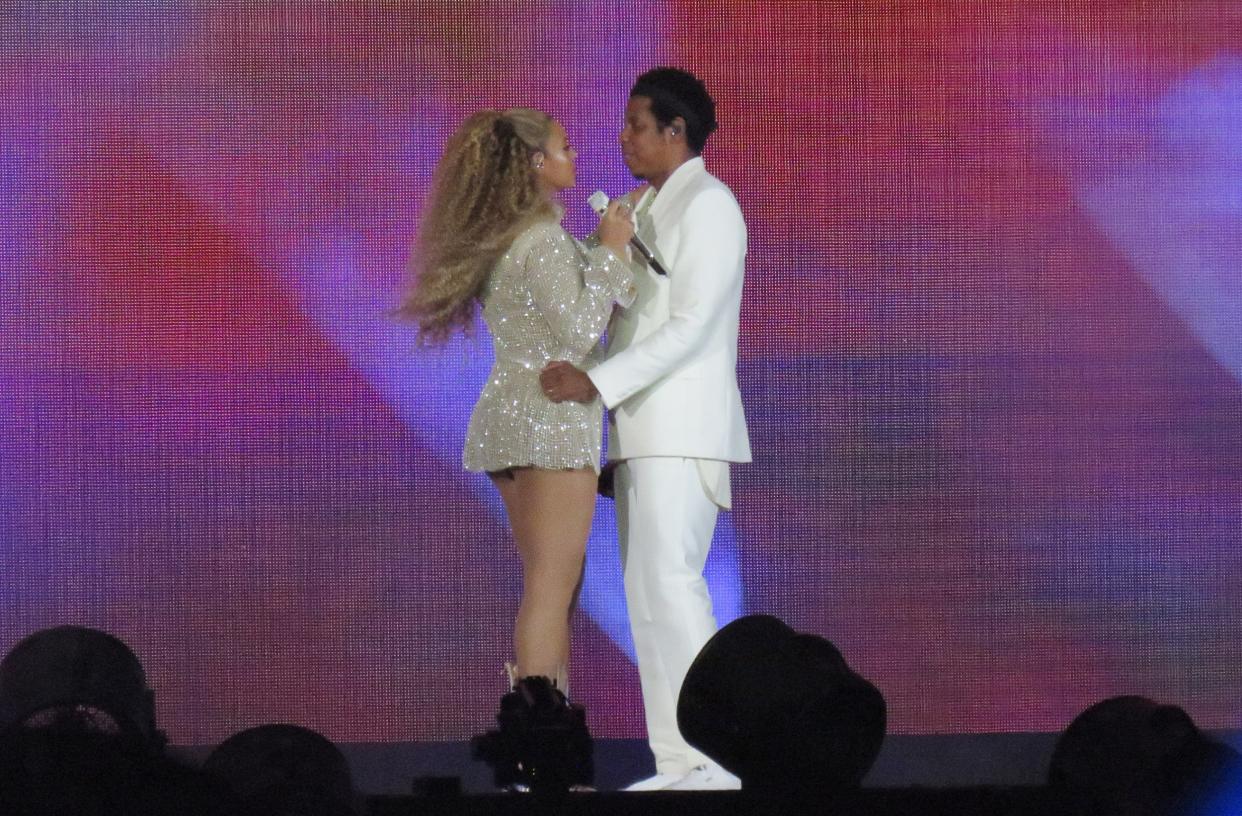 Big screen: Beyoncé and Jay-Z showed the World Cup Final before their On The Run II tour: SplashNews.com