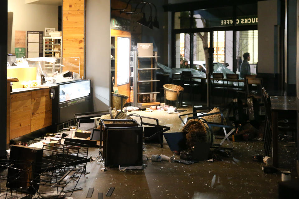 The inside of a Starbucks is seen after being looted by protesters.&nbsp;