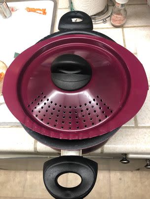 A nonstick pot with a built-in strainer top, which seems so obvious