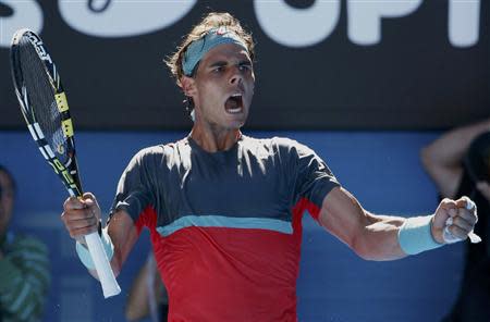 Rafael Nadal of Spain reacts after winning the second set during his men's singles quarter-final tennis match against Grigor Dimitrov of Bulgaria at the Australian Open 2014 tennis tournament in Melbourne January 22, 2014. REUTERS/Jason Reed