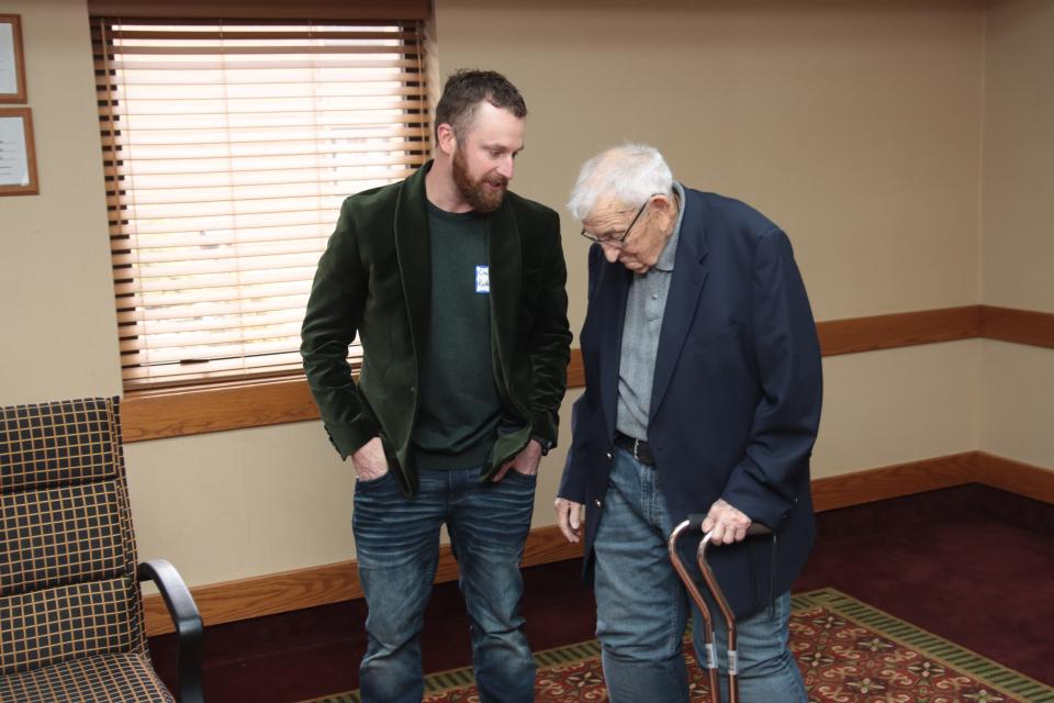 New Lenawee County Republican Party chairman Craig Rodosalewicz, left, talks with outgoing chairman Ted Dusseau Saturday, Feb. 25, 2023, during Ted Dusseau Day, an event county Republicans had at the Carlton Lodge in Adrian to honor Dusseau for his 30 years as party chairman.