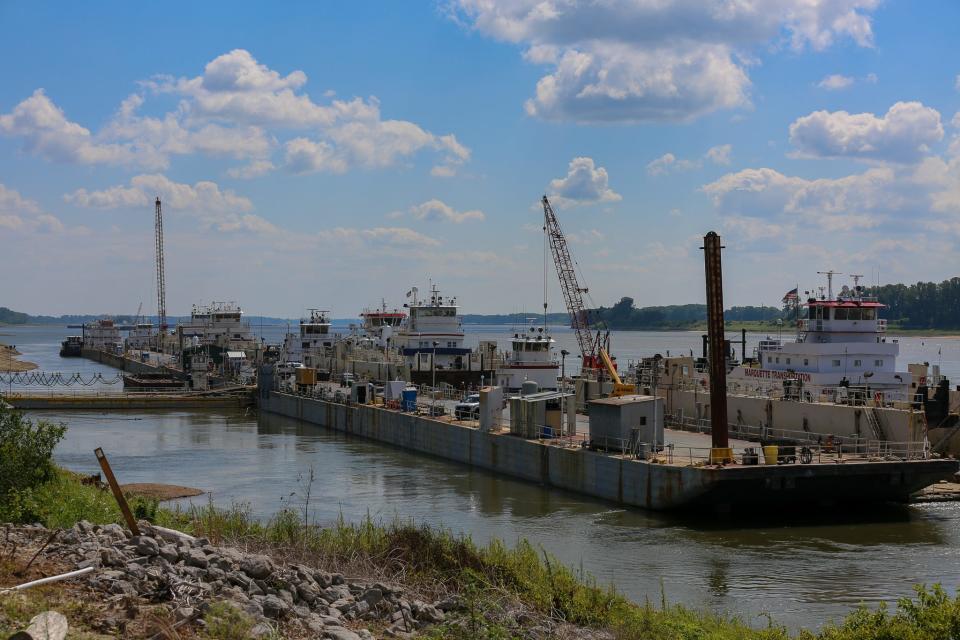 Towboats line a service facility on the Mississippi River near Wickliffe, Kentucky.